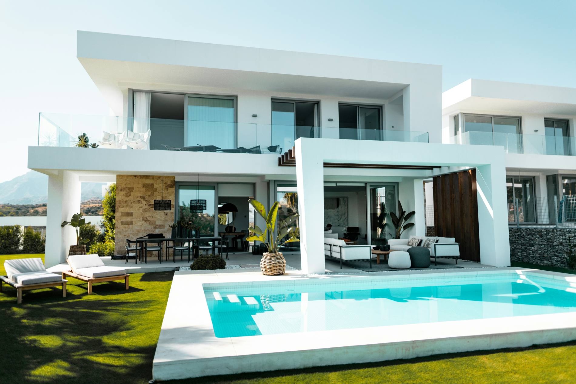 White contemporary villa with pool